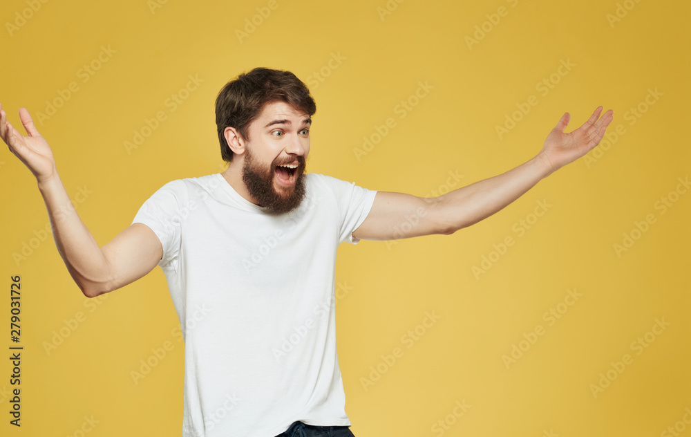 young man with arms raised young man with arms raised