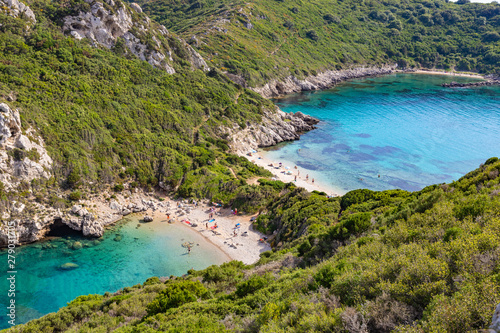 Famous two side Porto Timoni beach near Agios Georgios. Crystal clear azure water. Corfu, Greece © umike_foto