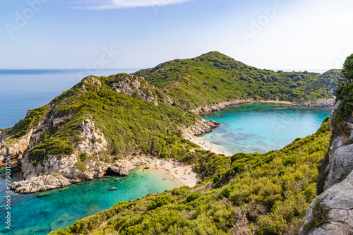 Famous two side Porto Timoni beach near Agios Georgios. Crystal clear azure water. Corfu, Greece © umike_foto