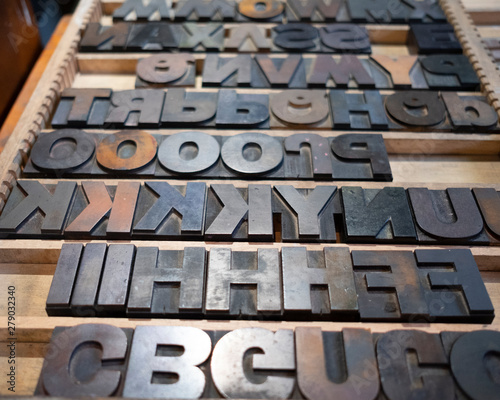Printing letter blocks for typesetting on old style printing press photo