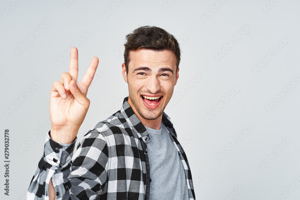 young man pointing at you young man pointing at you