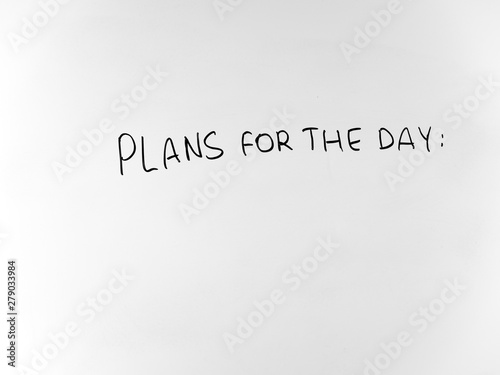 written in marker by hand text plans for the day