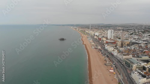 Wallpaper Mural Aerial footage of the Brighton beach and coastal area and the famous Brighton pier located in the south coast of England UK that is part of the City of Brighton and Hove, taken on a bright sunny day Torontodigital.ca