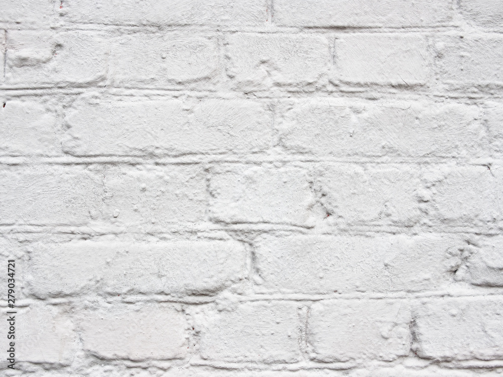 Obraz premium Closeup of white painted old coarse brick wall texture or background for design, banner and layout