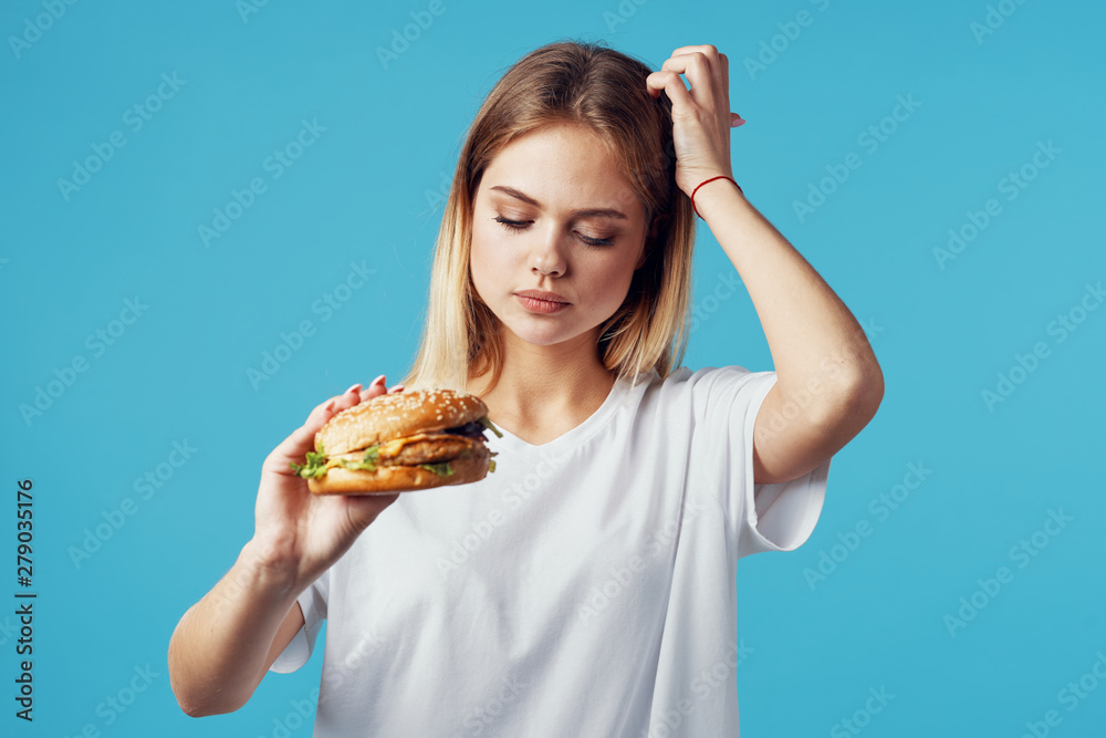 woman with hamburger woman with hamburger