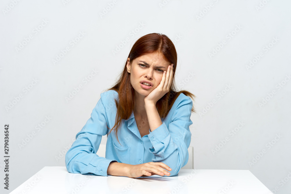 portrait of young woman sitting on sofa portrait of young woman sitting on sofa