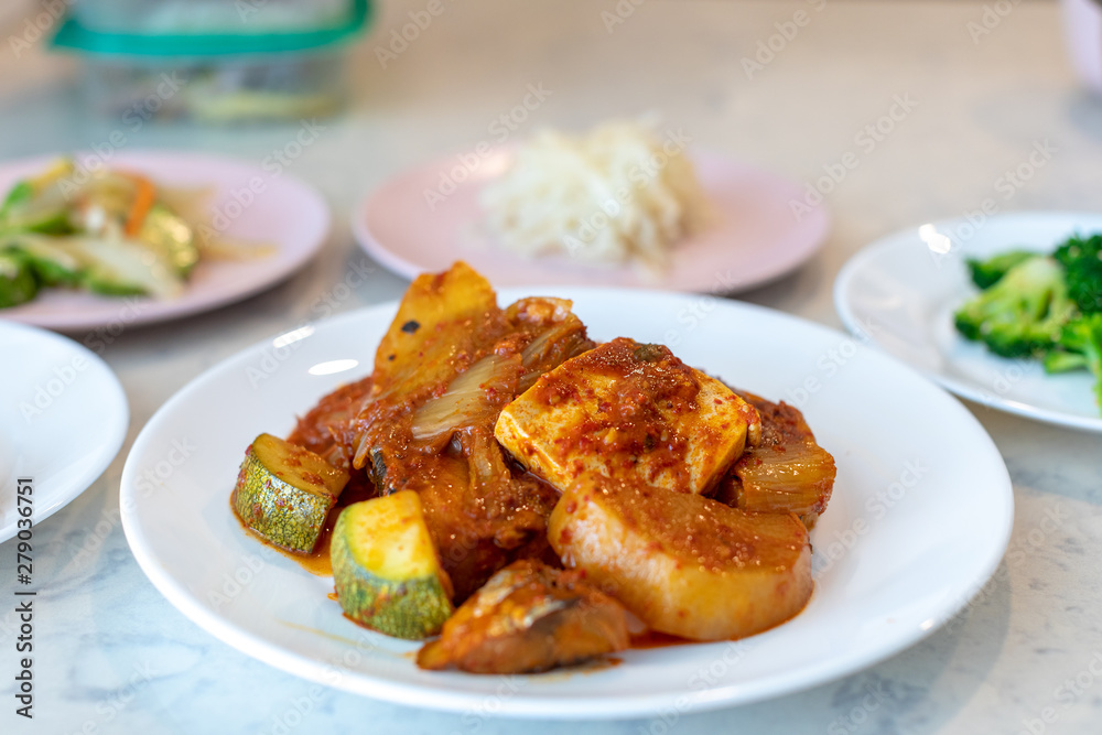 Stewed mackerel with Gochujang sauce, radish, pumpkin and Kimchi