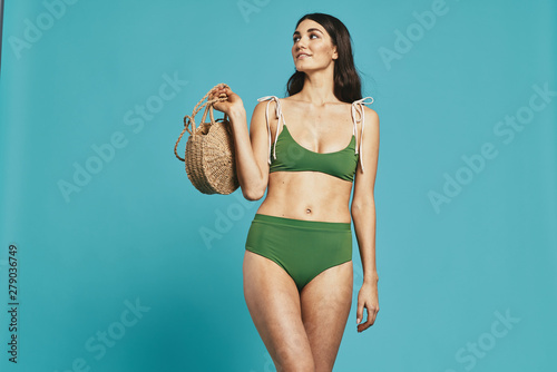 young woman in bikini with ball © SHOTPRIME STUDIO
