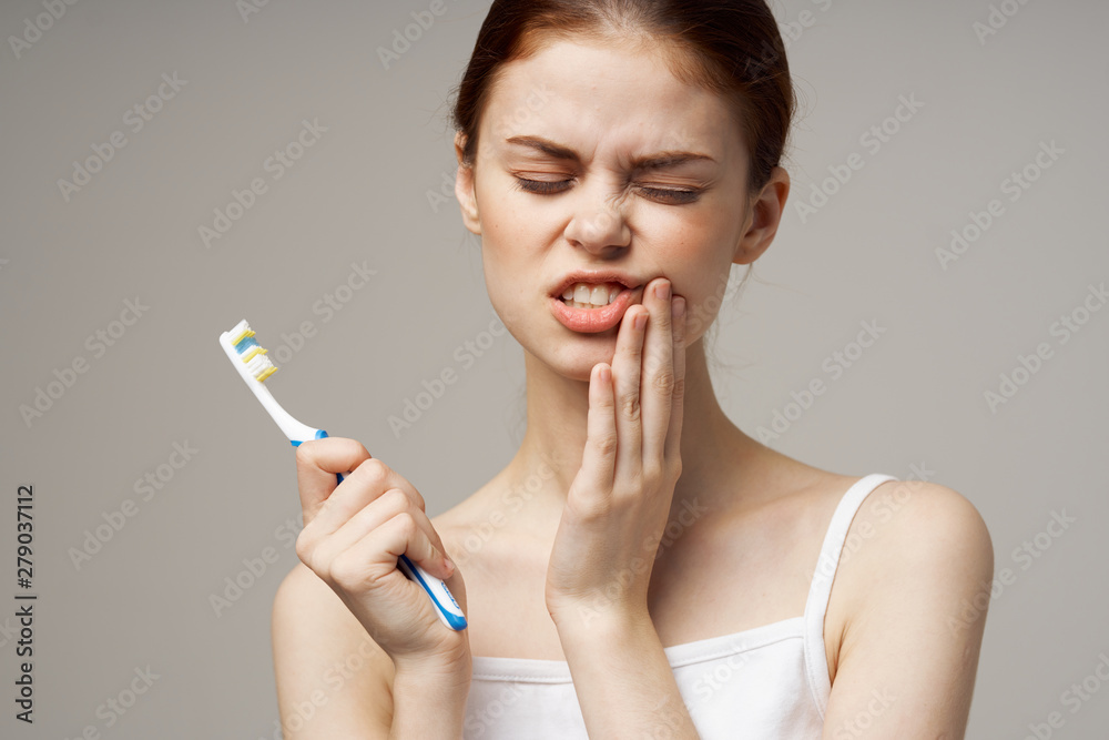 woman with brush for makeup woman with brush for makeup