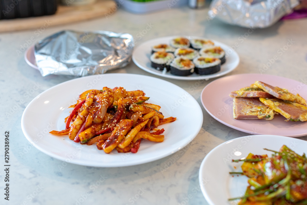 Delicious spicy stir fried squid on a plate, Korean food Delicious spicy stir fried squid on a plate, Korean food