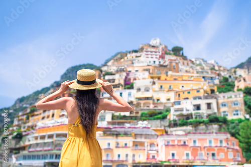 Obraz na płótnie Summer holiday in Italy. Young woman in Positano village on the background, Amalfi Coast, Italy w salonie
