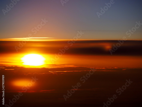 Sunset in a cloud seen on a flight
