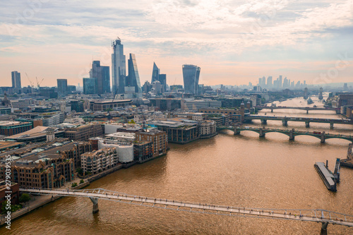 Aerial view of the river Thames near the city of London district with modern skyscrapers. photo