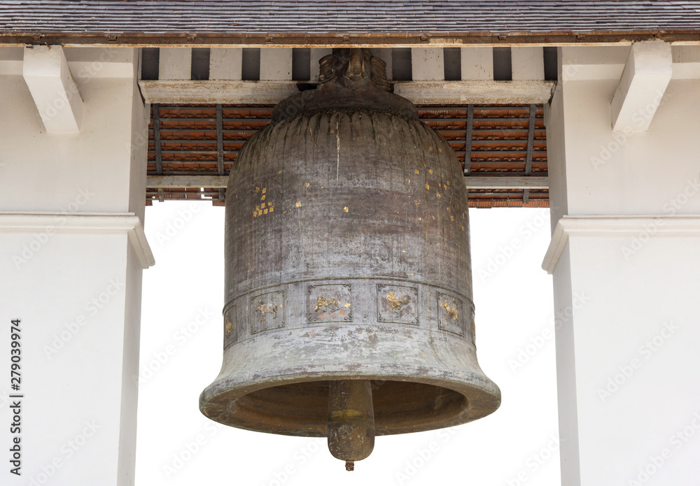 Obraz premium Old church bell isolated on white in the temple of lamphun, thailand