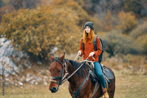 young woman riding horse © SHOTPRIME STUDIO