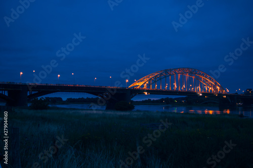 The Waalbridge Nijmegen during Night photo