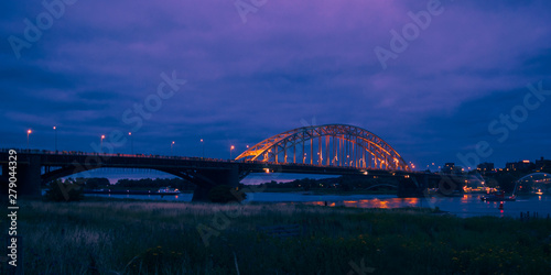 The Waalbridge Nijmegen during Night photo