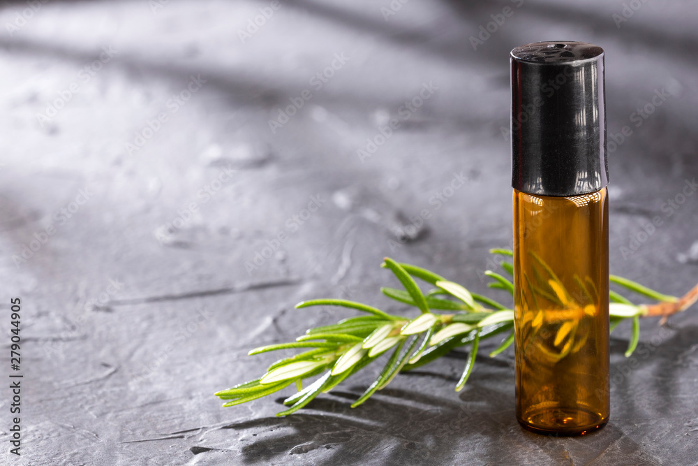 Fototapeta premium Rosmarinus officinalis - Rosemary leaves and oil