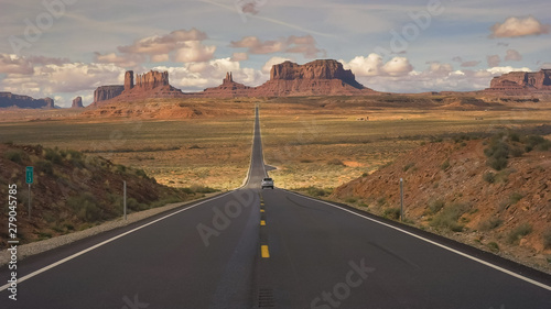 Photos silver car on highway 163 at monument valley