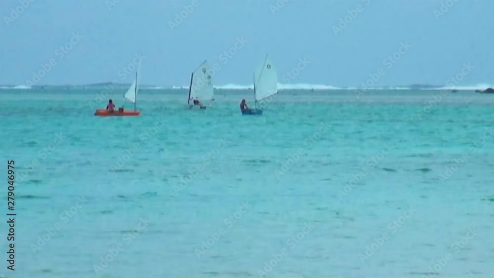 Paddle Boarding (Sup) Stand Up Paddling Video Of Man & Dog On Paddleboard (Paddle Board) Paddleboarding On Ocean Blue Water With Sailing Yacht Boats In Background. Summer Vacation Leisure Activity Paddle Boarding (Sup) Stand Up Paddling Video Of Man & Dog On Paddleboard (Paddle Board) Paddleboarding On Ocean Blue Water With Sailing Yacht Boats In Background. Summer Vacation Leisure Activity