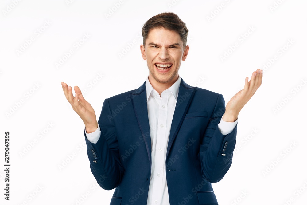 happy businessman with arms raised
