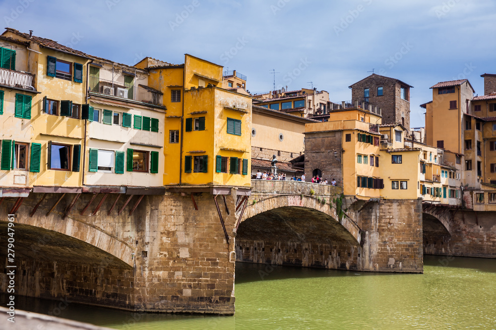 Ponte Vecchio a medieval stone closed-spandrel segmental arch bridge over the Arno River in Florence