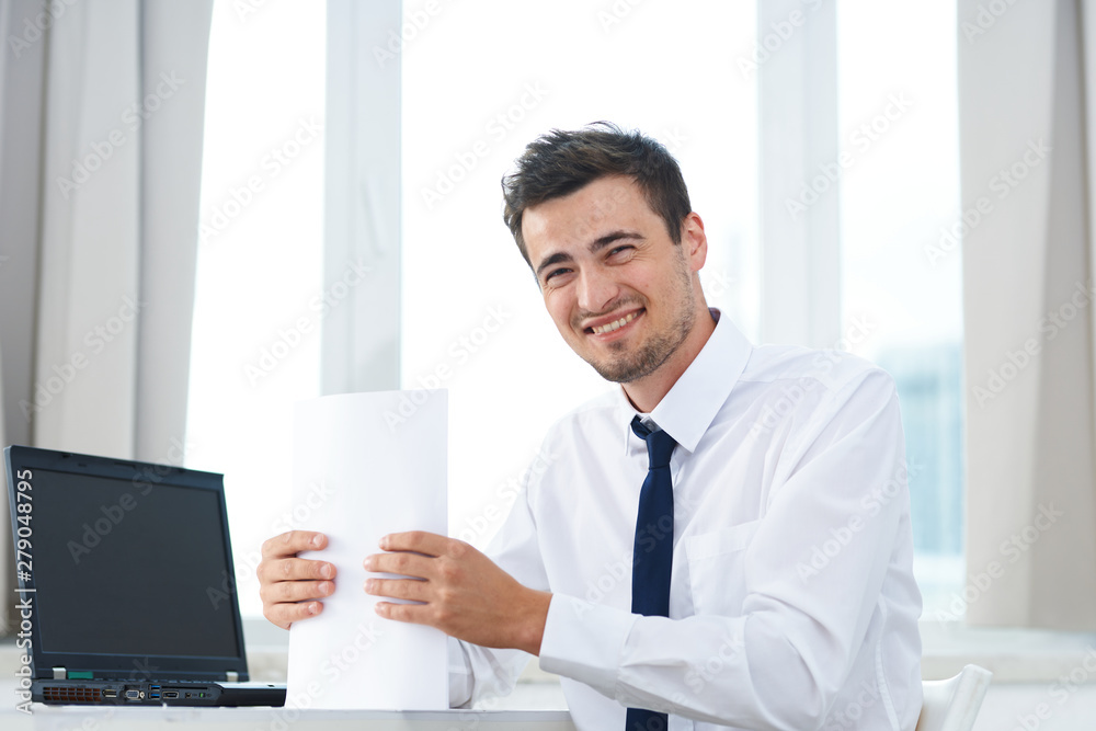 businessman working on his laptop in office businessman working on his laptop in office