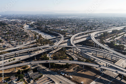 Aerial view of the Harbor 110 and Century 105 freeway interchange ramps and bridges near downtown Los Angeles in Southern California.