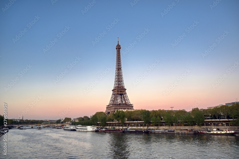 Fototapeta premium The Eiffel Tower across the River Seine in Paris, France.
