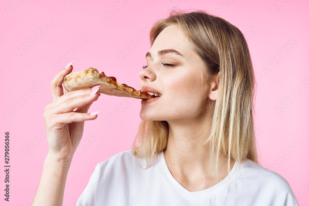 young woman eating cake