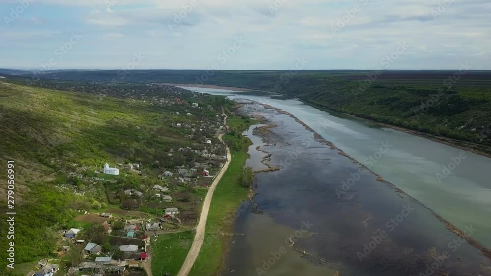 Arial view over the river and small village. Dniester river of Moldova republic.