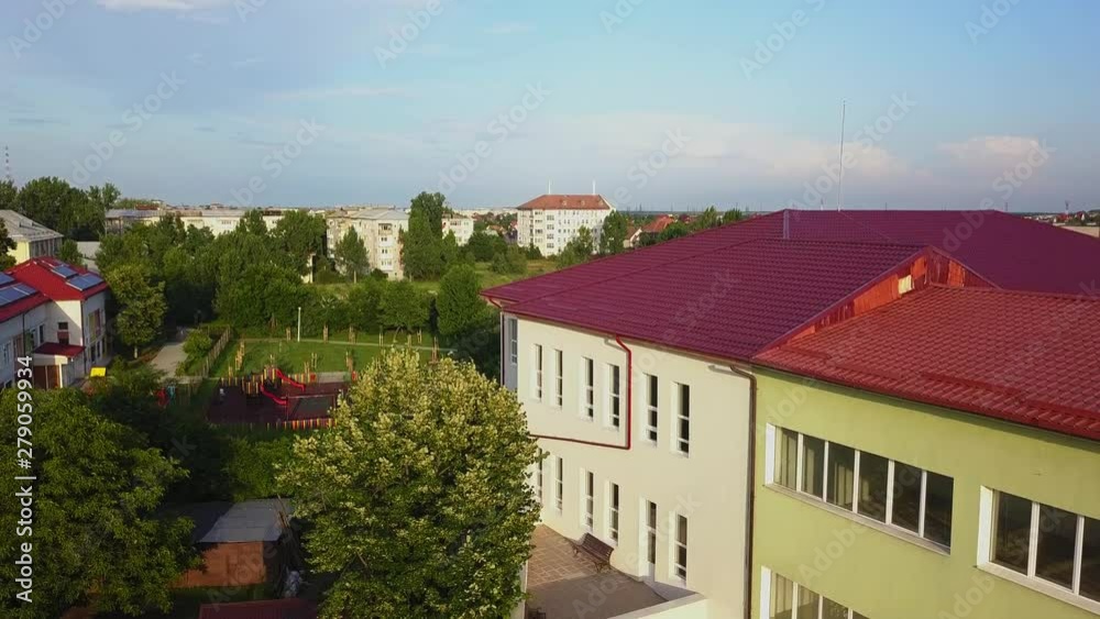 Aerial view of Slatina city and river Olt, Romania. Drone flight over the european city in summer day. Aerial view of Slatina city and river Olt, Romania. Drone flight over the european city in summer day.