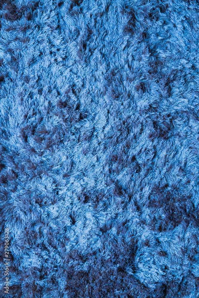 Blue fabric carpet with long pile texture Blue fabric carpet with long pile texture