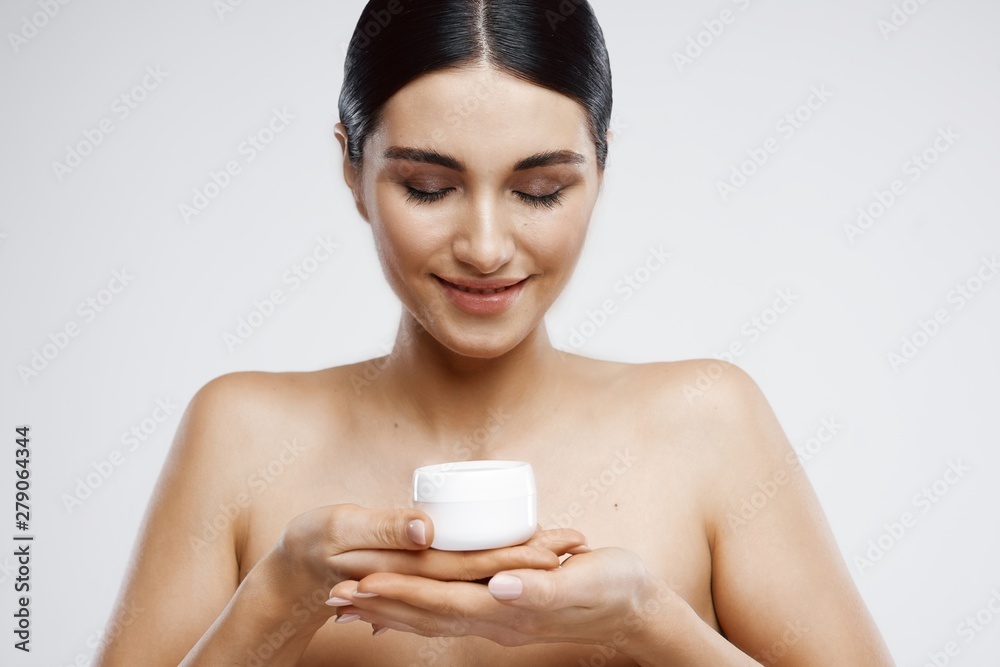 young woman with perfect skin looking at camera young woman with perfect skin looking at camera