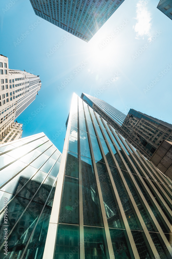 Naklejka premium Skyscrapers and Clear Blue Sky, Low Angle View, New York City
