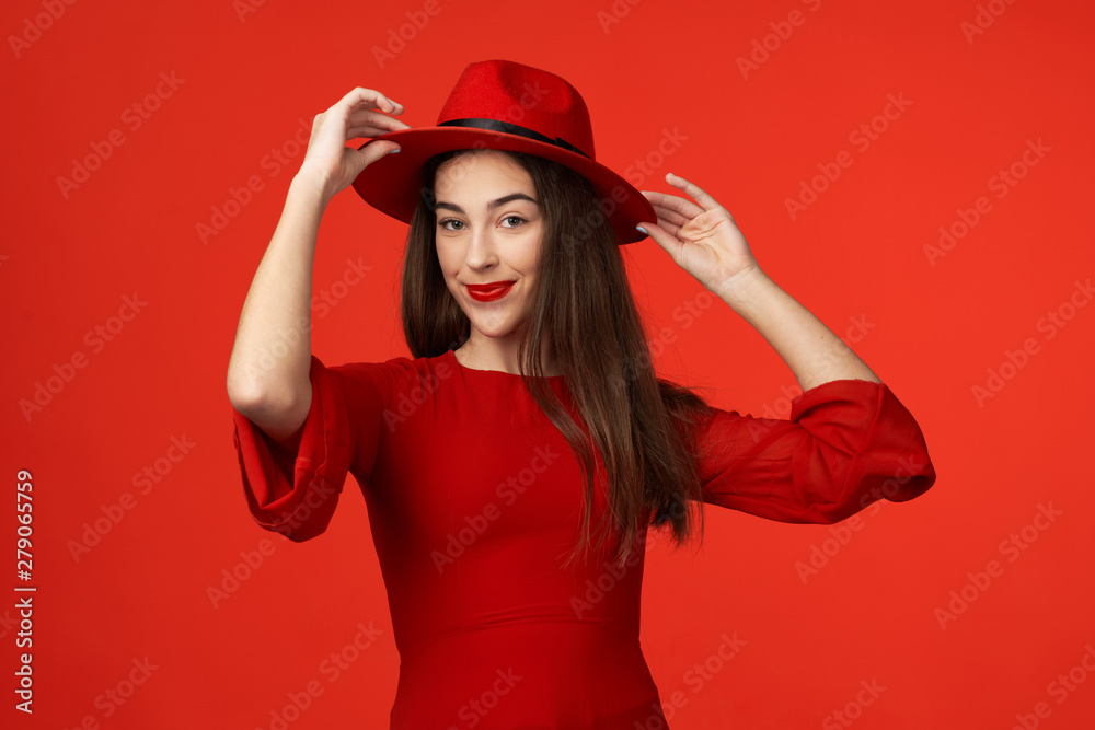 portrait of young woman in red hat portrait of young woman in red hat