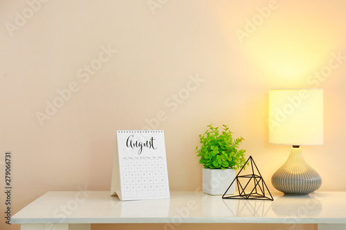 Calendar with lamp and deco...