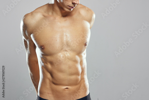 young man with naked body isolated on white background
