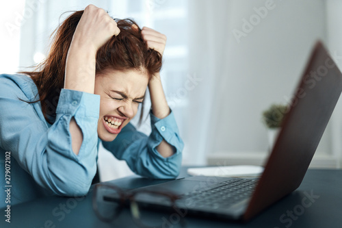 woman sleeping on laptop