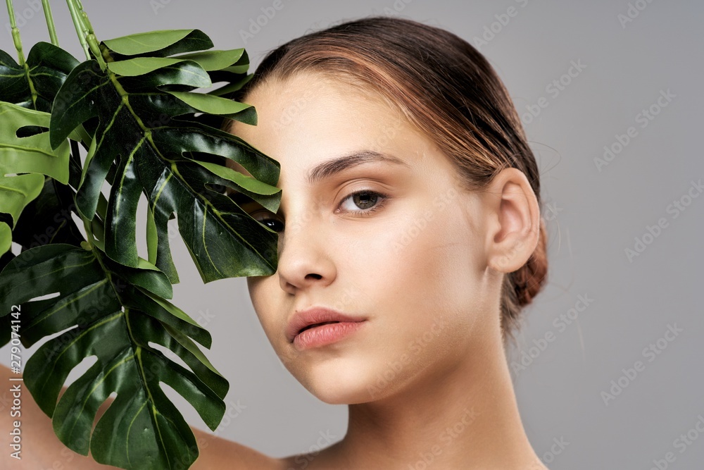 portrait of young woman with flower portrait of young woman with flower