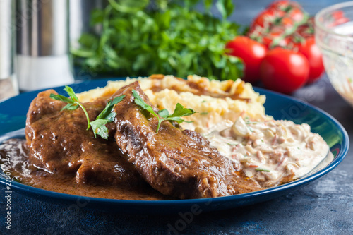 Stewed pork neck with potatoes and sauce