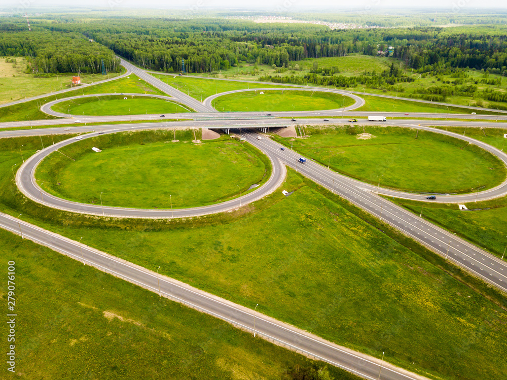 View above of a new highway road  with road junction in Russia