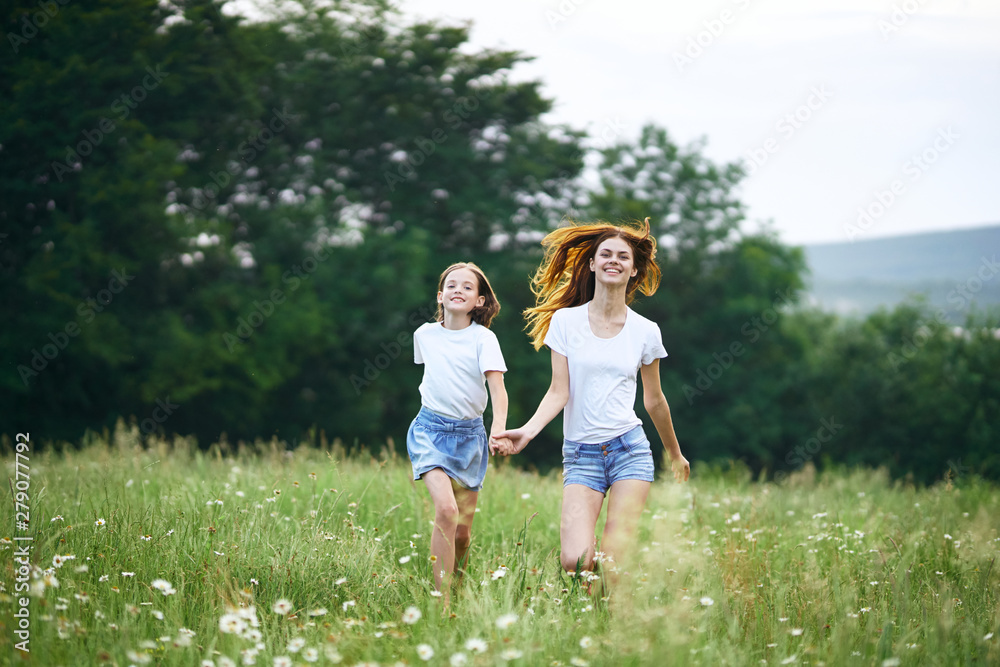 mother and daughter in the field