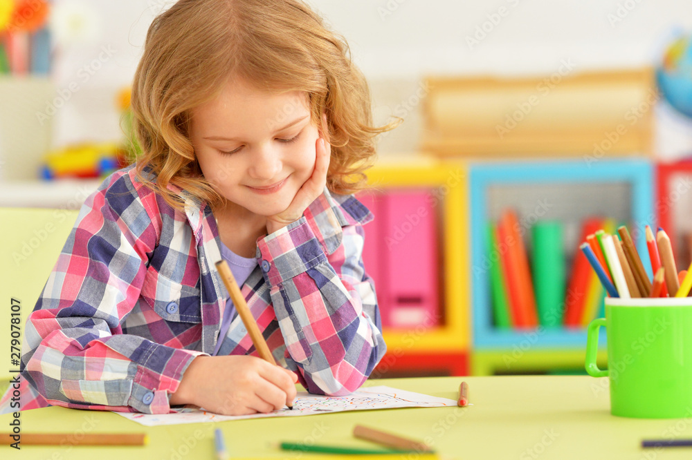 Portrait of cute smiling girl posing and drawing at home Portrait of cute smiling girl posing and drawing at home