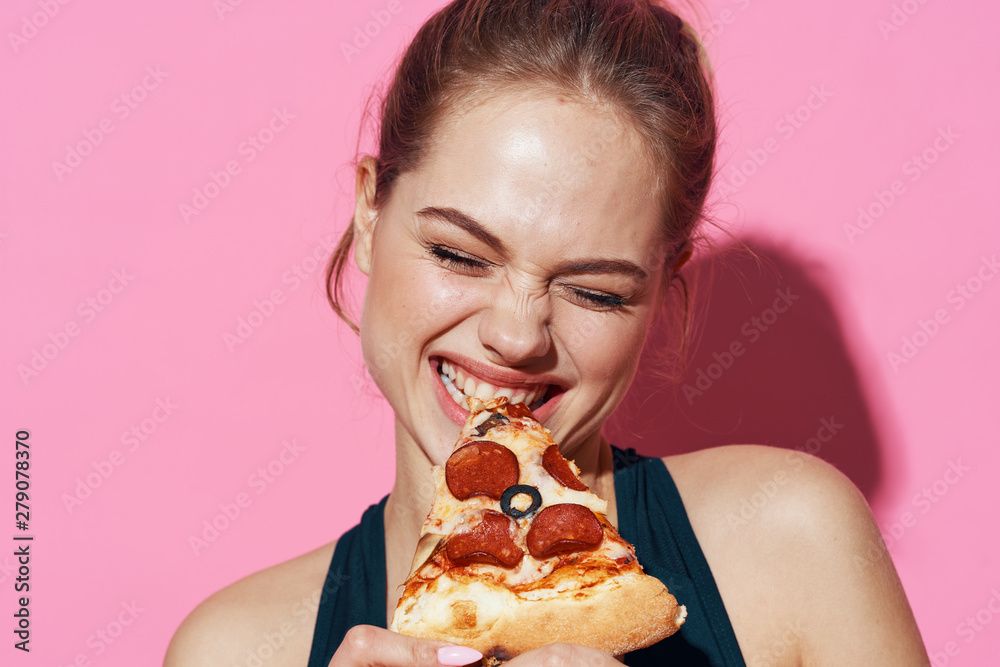 young woman eating cake