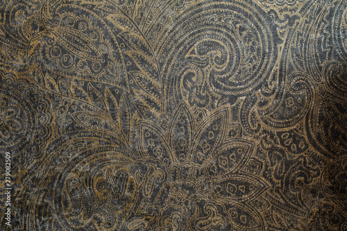 Old-fashioned wallpaper background with beautiful Eastern ornaments. Wallpaper in detail in close-up.