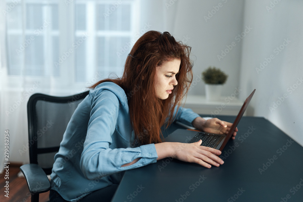 young woman reading a book on sofa young woman reading a book on sofa