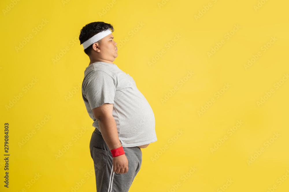 Fat men are showing their stomachs. Fat men are showing their stomachs.