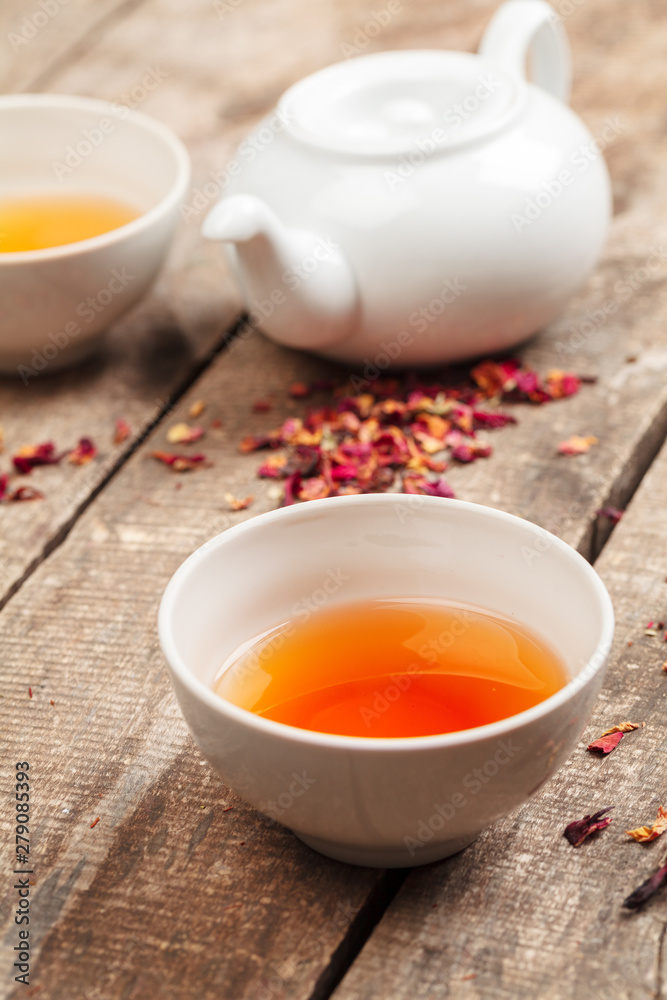 herbal tea in cups on a wooden background herbal tea in cups on a wooden background