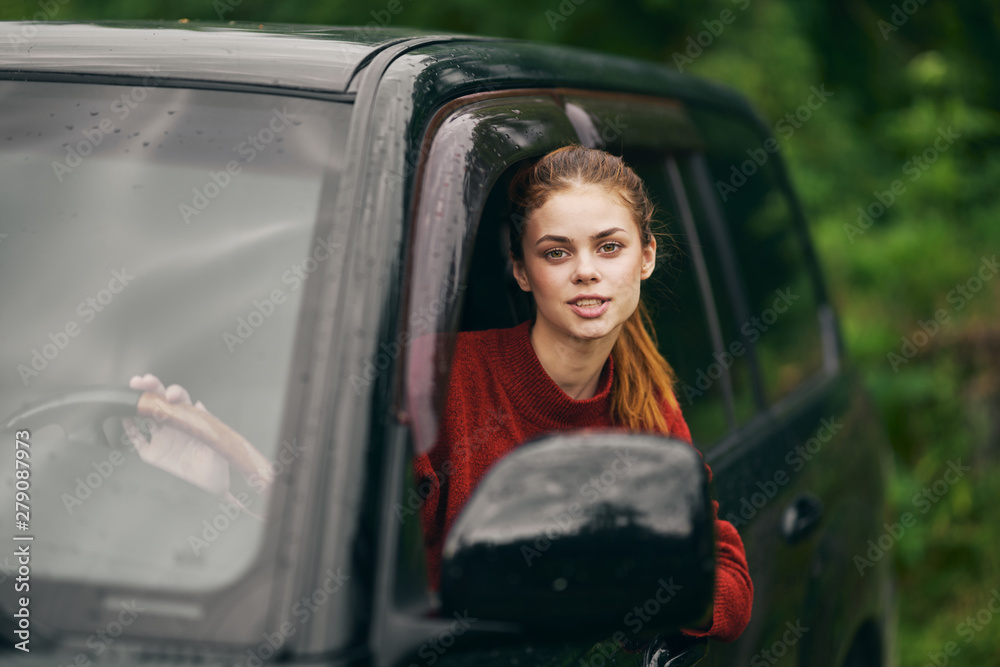 young woman in car young woman in car